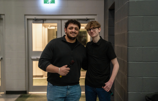 Ali and Keenan with microphones