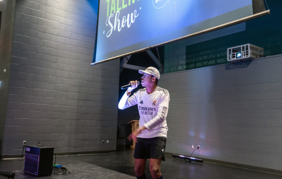 Contestant raps into the microphone