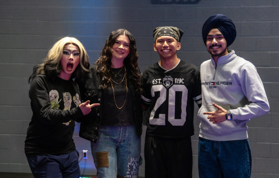 2nd place winner poses with the judges