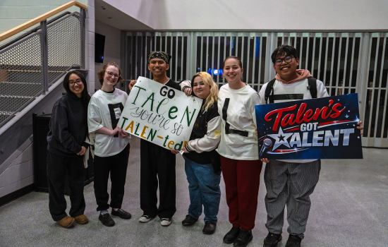 Talen poses with cheering section