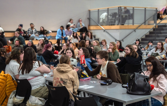Students laugh over a prize