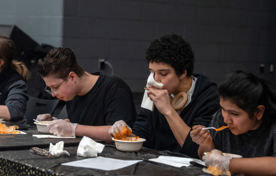 Contestants take on the spicy noodle challenge