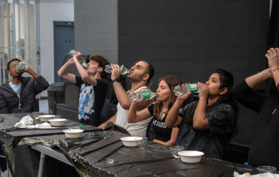 All the contestants chug bottles of Sprite