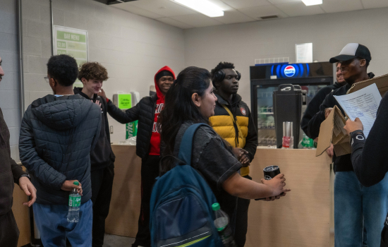 A winner is awarded with an SRC tumbler