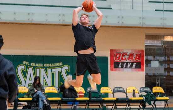 Team SRC jumps to make a practice basket