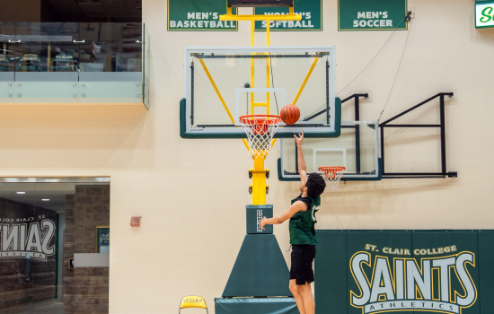Team SRC jumps to make a practice basket
