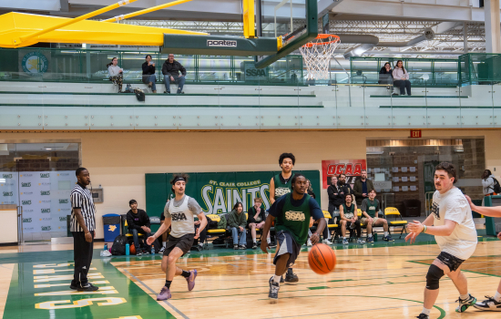 Basketball game in action, Team SRC has the ball