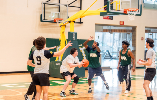 Basketball game in action, Team SSAA has the ball