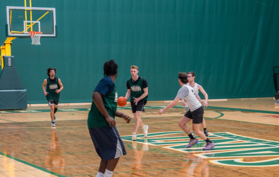 Basketball game in action, Team SRC has the ball