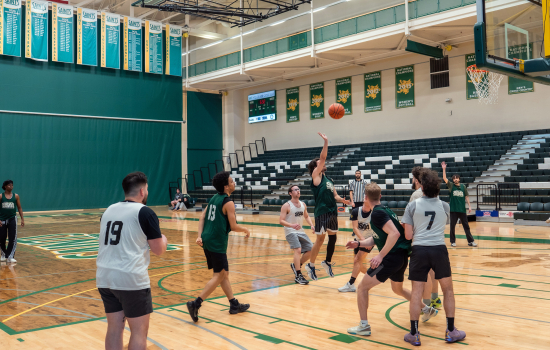 Basketball game in action, Team SRC makes a shot