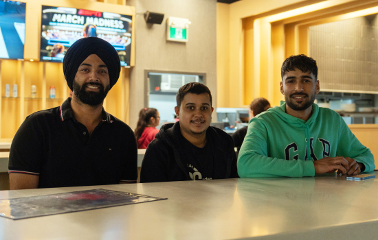 Students sit at the high top in Griff's