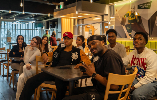 A group of students pose for a photo in Griff's