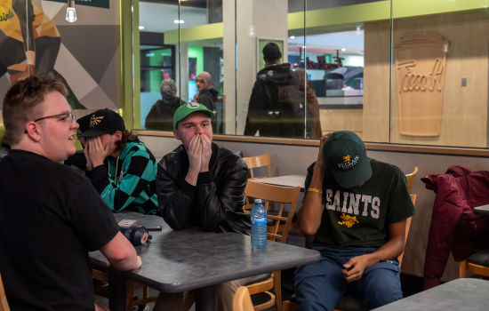 Students look shocked and embarrassed during the game