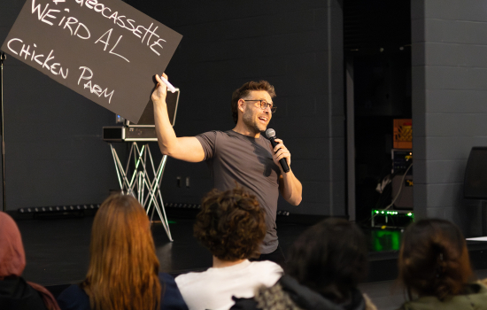Eric Leclerc holds up a sign