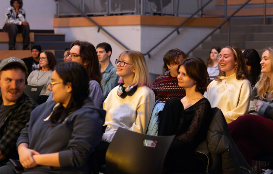 The audience enjoys the show in the SLC