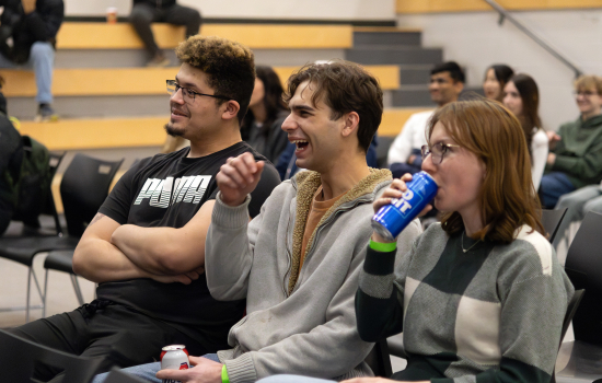 Audience of the magic show laughing in the SLC