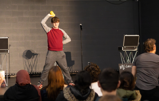 Eric has the student turn the cup upside down over his head