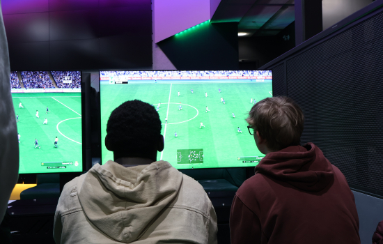Students play FIFA in the Nexus