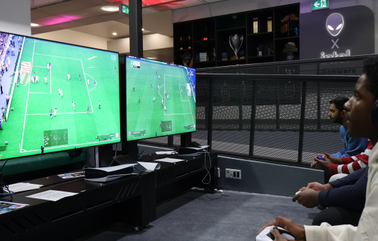 Students play FIFA in the Nexus