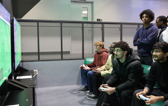 Students play FIFA in the Nexus