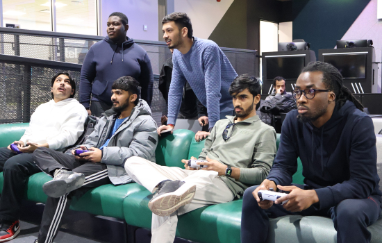 Students play FIFA in the Nexus