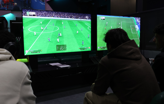 Students play FIFA in the Nexus