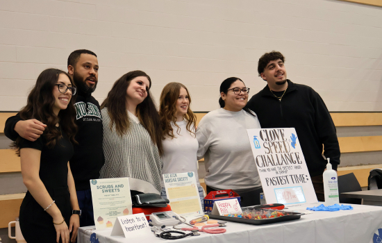 Nursing Society table with club members
