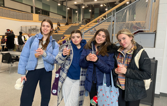 4 students enjoy free boba