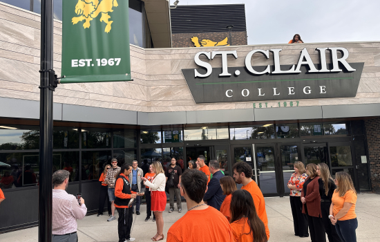 College community members take part in the smudging ceremony in front of south campus