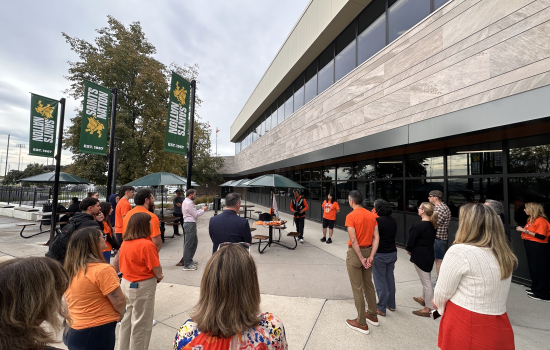 College community wears orange as they gather for a smudging ceremony and flag raising