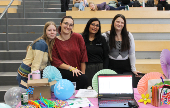 Club members at their booth in the SLC