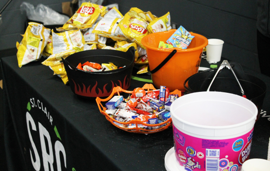 A closeup of the candy bar with an SRC tablecloth