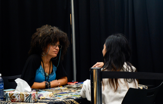 A student receives a tarot reading