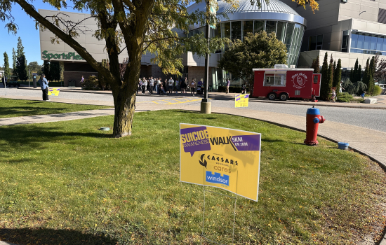 Signage outside the SportsPlex of the Suicide Awareness Month Community Walk