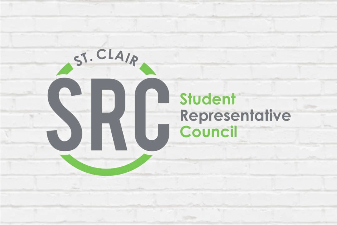 SRC logo on brick background